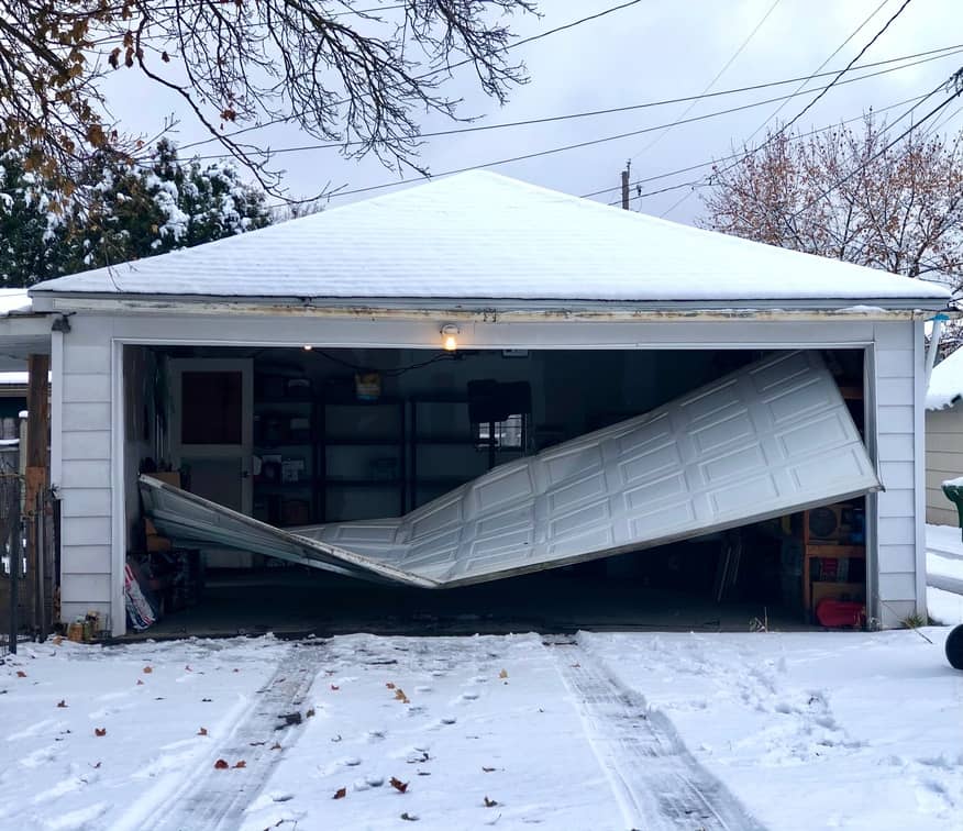 Obvious garage door damage.