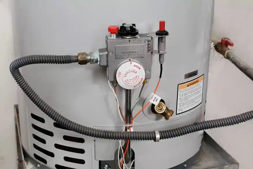 Turn the dial and adjust your water heater temperature.