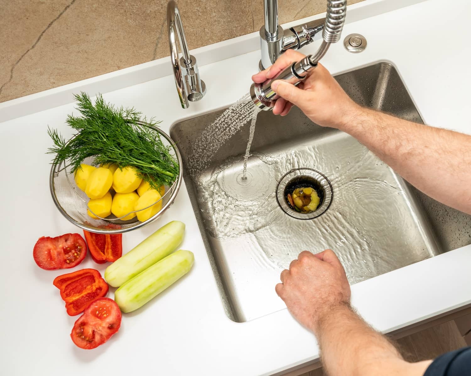 garbage disposal leaking from the bottom
