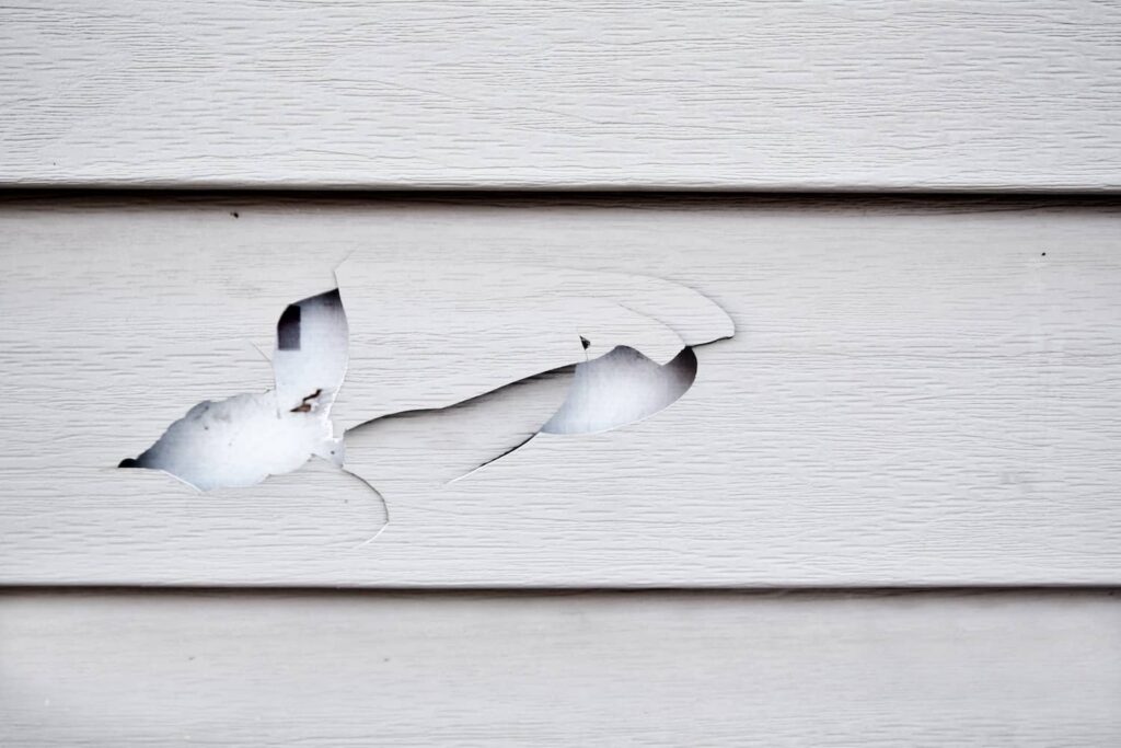 You may need to cut vinyl siding in order to replace damaged siding.